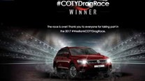 Winning poster of the Tiguan which won the #COTYDragRace 2017