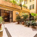 Colosseum Vacation Home in Rome, Italy - Level access is via a pretty courtyard which leads into the spacious, newly modernised home, with one bedroom and bathroom that have been specifically converted for guests with a disability or mobility issue. Source: