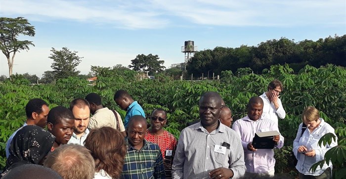 Dr Titus Alicai during the delegates' visit to The National Crops Resources Research Institute