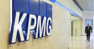 KPMG to cut 400 jobs in salvage operation