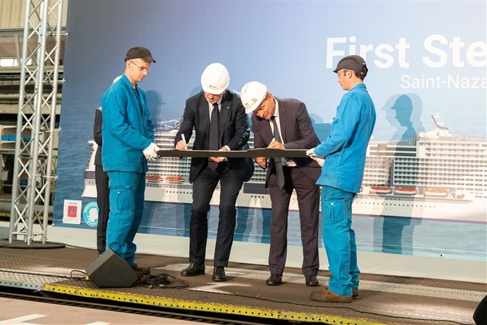 MSC Cruises Executive Chairman Pierfrancesco Vago and CEO of STX France Laurent Castaing cut the first steel of the newly named MSC Virtuosa.
