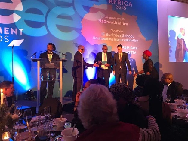 Acacia Mining's Buzwagi Gold Mine general manager Benedict Busunzu collecting the Wellbeing, Reward and Recognition Award for its No Harm 2020 programme<p>Image: