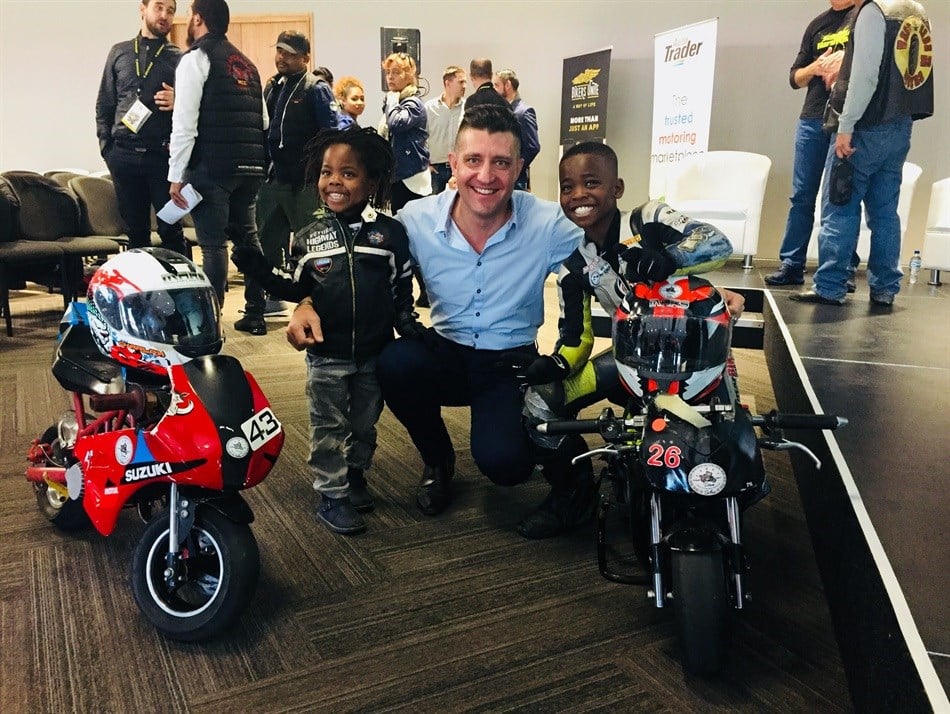 Passion starts young! Two bikers ride in to the venue to mark the end of the Conference. (l-r) Amohelang Phiri (four years old), AutoTrader CEO George Mienie, Oratilwe Phiri (nine years old). Photos published with consent from mother Tsilane Phiri.