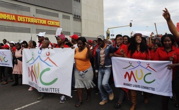 Informal traders and supporters marching to the City Hall in Durban on Friday to protest proposed regulations which they say will prevent many people from earning a living. Photo: Nomfundo Xolo