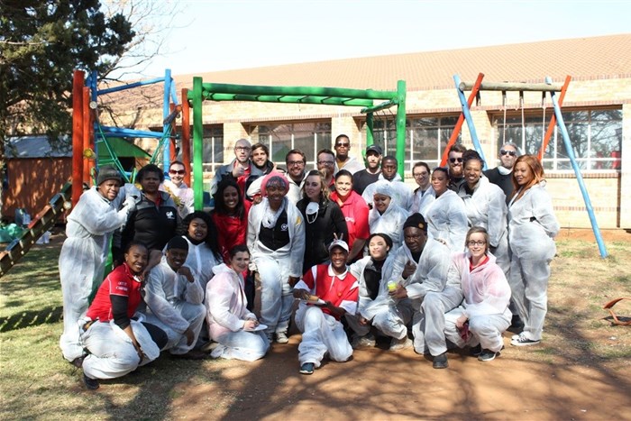 OFM staff embraces Mandela Day by prettifying house of safety