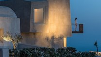 Kapsimalis Architects completes cave-like summer residence on outskirts of Pyrgos