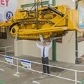Pratley replicates its famous suspended bulldozer stunt