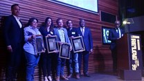 The 2018 Standard Bank Sikuvile Journalism Awards' investigative journalism and story of the year winners on stage.