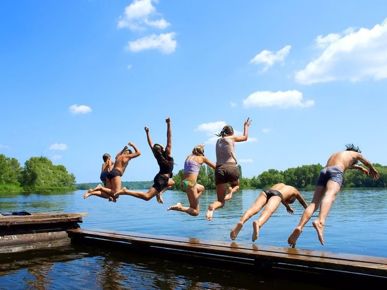 Kids enjoy a dip into a river in Ukraine. (Shutterstock)
