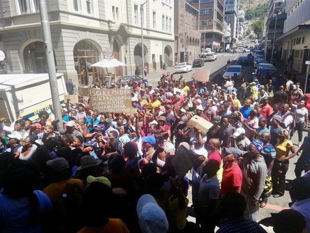 Over 200 land occupiers from Schulphoek, Hermanus, picketed outside the Western Cape High Court on Tuesday. Photo: Thembela Ntongana / GroundUp