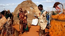 An aid worker collects health and nutrition data in northeastern Kenya. Shutterstock