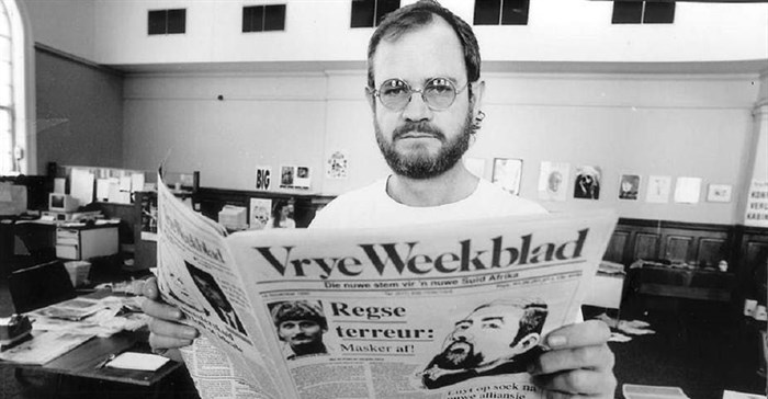 Editor Max du Preez with one of the early editions of Vrye Weekblad. .