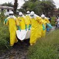 Health workers in Liberia at the height of the 2014-2016 Ebola outbreak. Ahmed Jallanzo/EPA