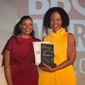 Pictured above (right) is Dr Nobuhle Judy Dlamini, winner of the Comair Outstanding Woman in Business Award and the overall Platinum Award for the evening, with Njabulo Sithole (left), Member of the Comair Board of Directors.