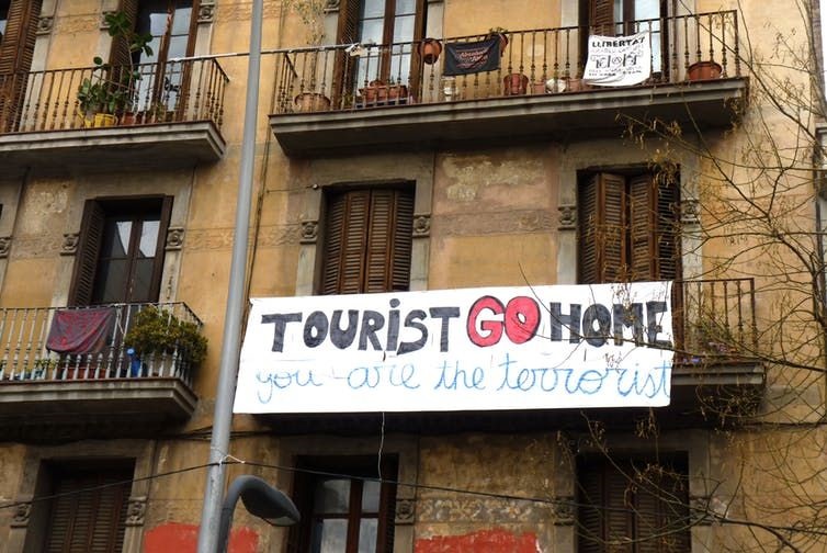 Locals send a message in Barcelona. ,