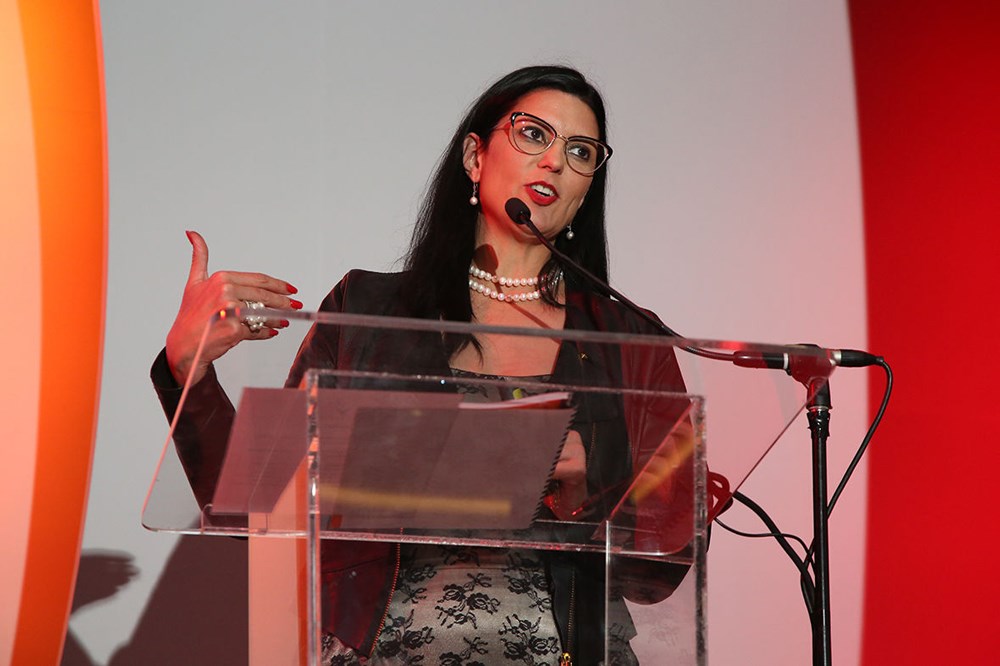 Sarina de Beer, director: client experience at Ask Afrika presenting at the Ask Afrika Orange Index awards