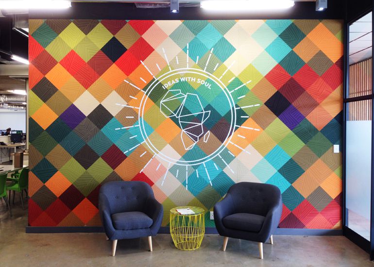 Branding walls and creating floor to ceiling artworks with Canvex