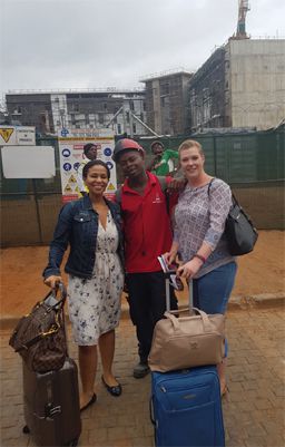 Zuki Jantjies, CLHG divisional director: sales and marketing, and Jennifer Beard, group sales manager, receive a warm welcome from workers on the construction site of Town Lodge Umhlanga during Africa’s Travel Indaba in May 2019.