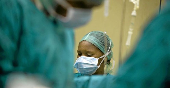 Doctors and nurses were held at gunpoint to stop giving patients treatment. (Paul Botes)