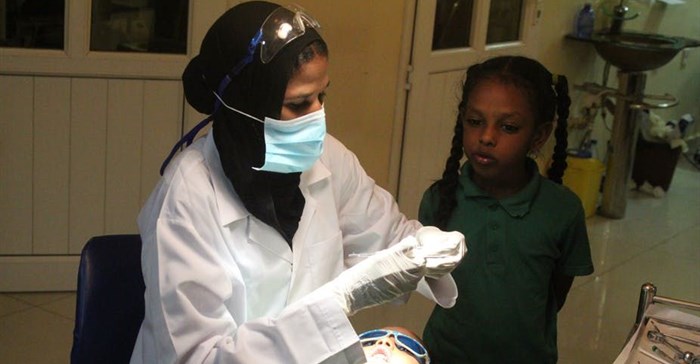 A child about to have his rotten tooth capped at the author’s clinic in Khartoum, Sudan. Author provided