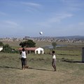Young girls play netball in an open field near King Williams Town. EPA/Kim Ludbrook