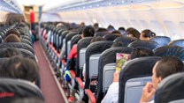 Air travel spreads infections globally, but health advice from inflight magazines can limit that