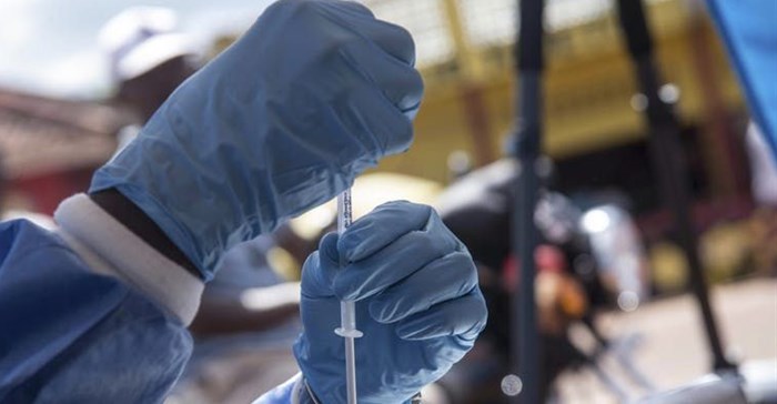 A health worker prepares to administer Ebola vaccination in the north-western Democratic Republic of the Congo.<p>EPA-EFE/STR
