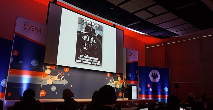 Daniel Thebe presenting at #CEM19. Yes, Darth Vader music played as he walked on stage
