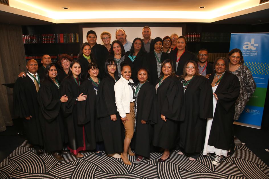 Old Mutual graduates with their principals and Michellene Barnes, a SAICA Thuthuka bursary recipient who worked at Old Mutual with our graduates.