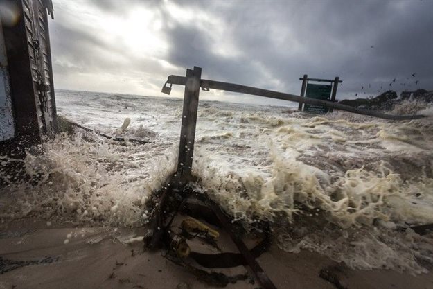 Winter storms surge across the slipway at The Kom, causing damage to infrastructure. Photo: Mark Harley