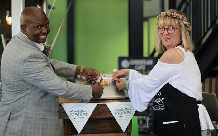 Executive Mayor of Nelson Mandela Bay, Cllr Mongameli Bobani, alongside Locally Yours market director Annelize Botha celebrating the official launch of the online store.