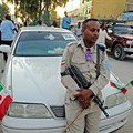A police officer is seen in Hargeisa, Somaliland, on May 16, 2016. Police in Hargeisa recently arrested Horyaal 24 TV owner Mohamed Osman Mireh. Credit: CPJ/AFP/Mohamed Abdiwahab.