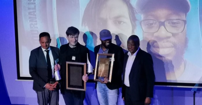 Standard Bank Sikuvile 2019 journalist and SA story of the year winners, Dewald Van Rensburg and Sipho Masondo of City Press.