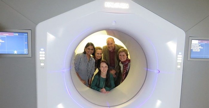 The new Halcyon radiotherapy machine at Groote Schuur hospital. In front is Nanette Joubert, medical physicist. Back from left to right: Dr Bhavna Patel, CEO of the hospital; Dr Bernadette Eick, chief operations officer; Francois Heyns, a patient; and Prof Jeannette Parks; head of radiation oncology. Photo: Elsabé Brits