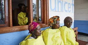 Unicef carers at a creche for children whose parents are being treated for Ebola. Building health infrastructure is crucial to stopping the next outbreak. Epa/ Hugh Kinsella Cunningham