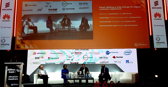 The digital CX keynote at AfricaCom. Moderated by Lionel Reina, CEO of the APO Group; the panel included Unathi Mtya, CTO at Grindrod Bank; Bertrand Fallon-Kund, partner at Bain & Company; and Francis Mumbi, innovation lead at Stanbic Bank.
