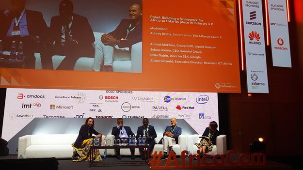AfricaCom's keynote panel on 'building a framework for Africa to take its place in Industry 4.0'. Moderator Aubrey Hruby is author and investment advisor of Africa Expert Network, with panelists Ahmad Mokhles, group COO of Liquid Telecom; Sekou Drame, CEO of Sonatel Group; Nitin Gajria, SSA director of Google; and Dr Alison Gillwald, executive director of Research ICT Africa.