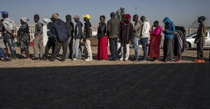 People affected by xenophobic violence queue prior to being transported back to their countries from Johannesburg, South Africa. Kim Ludbrook/EPA-EFE