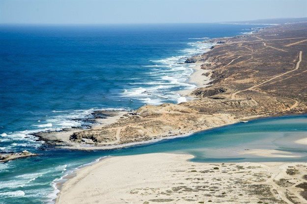 The mouth of the Olifants River estuary on the West Coast. The beaches to the north (in the background) are or have been heavily mined for diamonds and heavy minerals. Photo: John Yeld