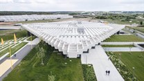 COBE creates giant rhomboid roof for new Adidas' HQ in Germany