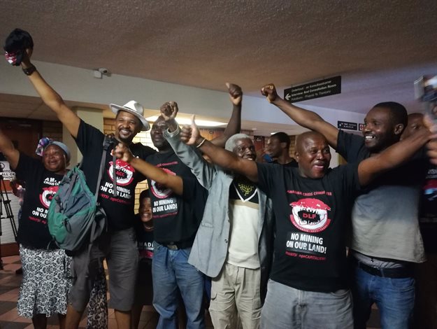 Xolobeni community members celebrated at the North Gauteng High Court in November 2018 after Judge Annali Basson ruled that the Department of Mineral Resources has to obtain consent from communities before granting a mining right to a company. Archie photo: Zoë Postman