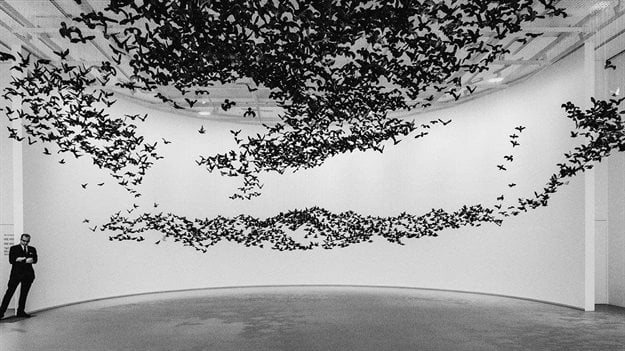 Cai Guo-Qiang's porcelain bird installation (10,000 gunpowder-blackened porcelain starlings) suspended at the National Gallery of Victoria, Melbourne. Image courtesy of The House Glass.