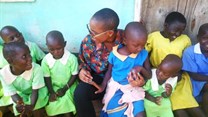 AECOM's Kevina Kakembo lends a hand in Uganda WeDev water-sanitation project