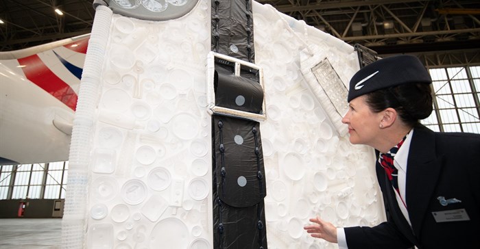 Eco-artist Sarah Turner's giant suitcase made of plastic is on display at Heathrow.