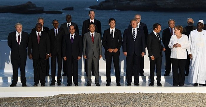 In happier and less challenging times: world leaders and guests pose for a picture on the second day of the annual G7 summit in Biarritz, France, August 2019. Photo by Andrew Parsons - Pool/Getty Images