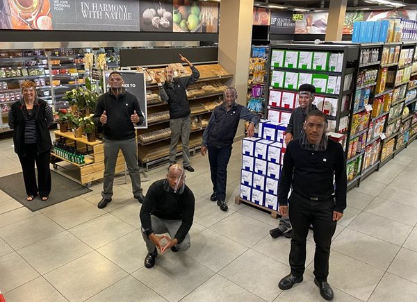 Jeffrey's Bay Woolworths employees wearing protective visors