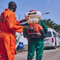 Lagos state officials disinfecting roads in the state. Shutterstock