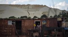 Grootvlei, Snake Park, an impoverished suburb on the fringe of one of the biggest mine dumps in Soweto, Johannesburg. Poor people have been hit hardest by the fallout of Covid-19. Mujahid Safodien/AFP via Getty Images