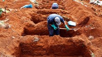 Gravediggers are exhuming old graves in Brazil to open new spaces. Brazil is currently second in the world for cases and deaths, and many consider it the new global epicentre. Sebastiao Moreira/EPA