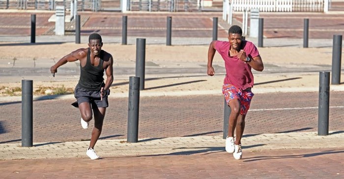 People exercising in Ellis Park in Johannesburg, South Africa. Dino Lloyd/Gallo Images via Getty Images